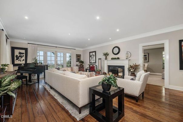 Fireplace, Interior, Living room, Piano, Recessed Lighting, Wood Texture Flooring