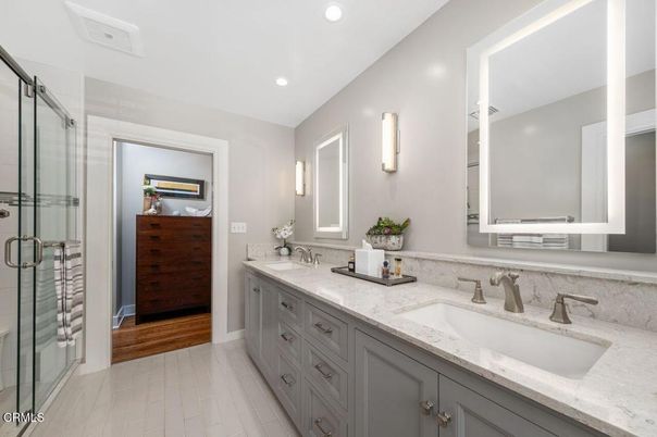 Bathroom, Dual Sink Vanities, Glass Shower, Interior, Recessed Lighting, Wood Texture Flooring