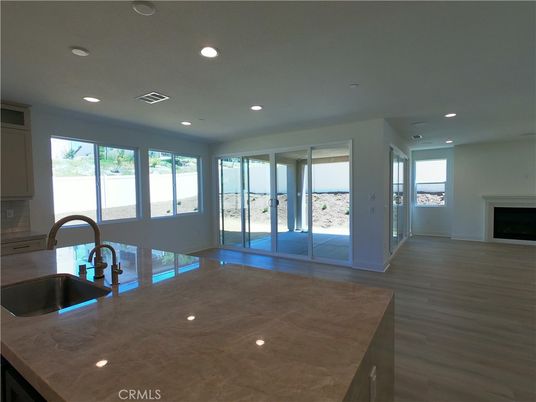 Empty room, Fireplace, Interior, Kitchen, Recessed Lighting, Wood Texture Flooring