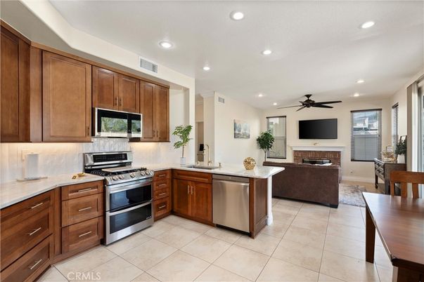 Fireplace, Interior, Kitchen, Recessed Lighting, Stainless Steel Appliances