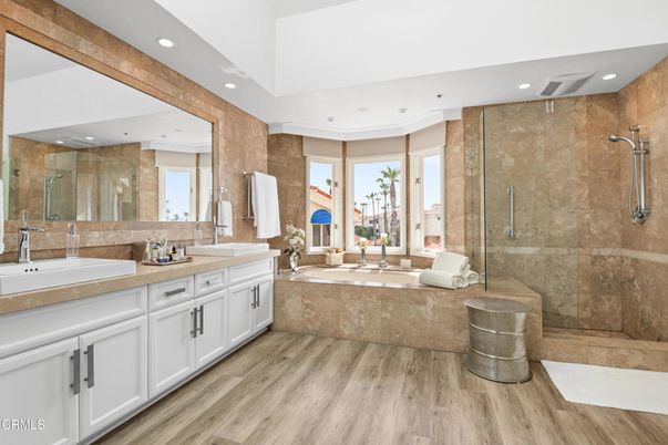 Bathroom, Dual Sink Vanities, Glass Shower, Interior, Recessed Lighting, Wood Texture Flooring