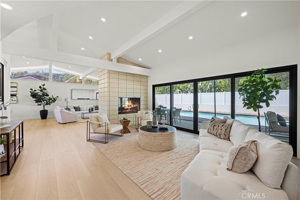 Fireplace, Interior, Living room, Recessed Lighting, Water, Wood Texture Flooring