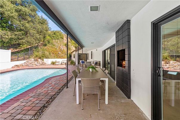 Exterior, Fireplace, Pool