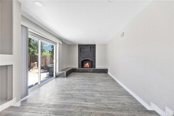 Fireplace, Interior, Recessed Lighting, Wood Texture Flooring