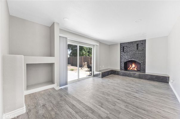Empty room, Fireplace, Interior, Recessed Lighting, Wood Texture Flooring