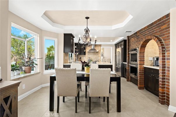 Chandelier, Dining room, Interior, Kitchen, Recessed Lighting, Stainless Steel Appliances, Stone Walls
