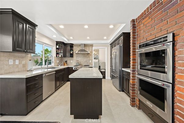Interior, Kitchen, Recessed Lighting, Stainless Steel Appliances, Stone Walls