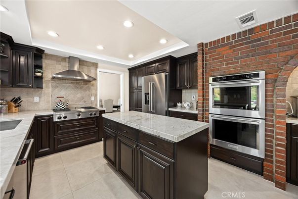 Interior, Kitchen, Recessed Lighting, Stainless Steel Appliances, Stone Walls