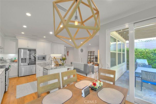Dining room, Interior, Kitchen, Recessed Lighting, Stainless Steel Appliances, Wood Texture Flooring