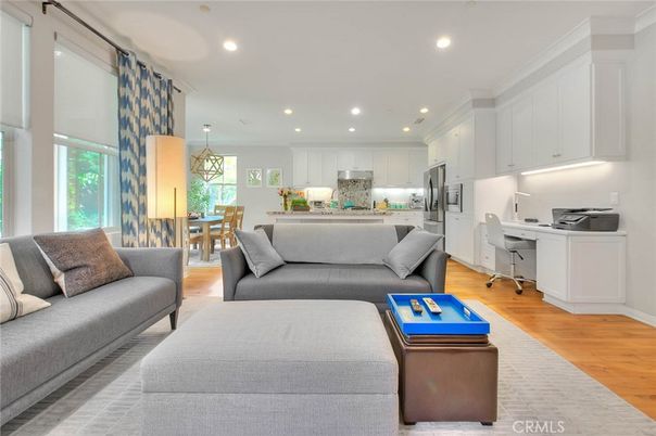 Chandelier, Dining room, Interior, Kitchen, Living room, Pendant Lights, Recessed Lighting, Stainless Steel Appliances, Wood Texture Flooring