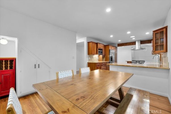 Dining room, Interior, Kitchen, Recessed Lighting, Stainless Steel Appliances, Wood Texture Flooring