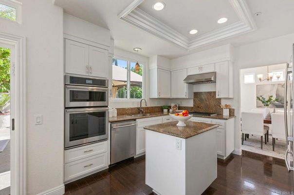 Chandelier, Dining room, Interior, Kitchen, Recessed Lighting, Stainless Steel Appliances, Wood Texture Flooring