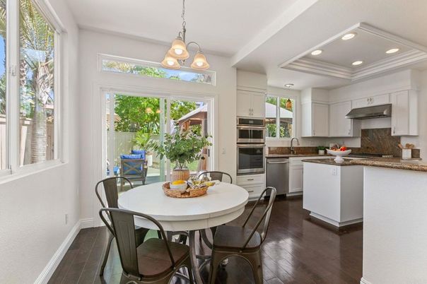 Chandelier, Dining room, Interior, Kitchen, Recessed Lighting, Stainless Steel Appliances, Wood Texture Flooring