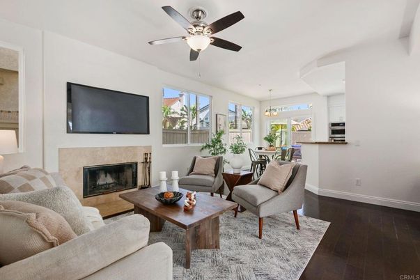 Dining room, Fireplace, Interior, Kitchen, Living room, Pendant Lights, Stainless Steel Appliances, Wood Texture Flooring