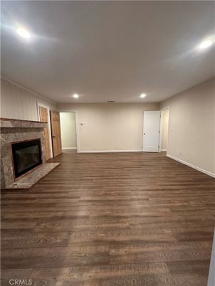 Empty room, Fireplace, Interior, Recessed Lighting, Wood Texture Flooring