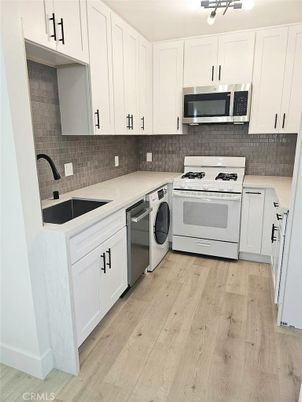 Interior, Kitchen, Stainless Steel Appliances, Wood Texture Flooring