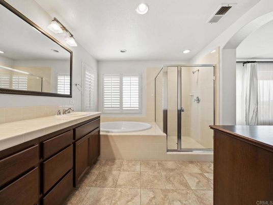 Bathroom, Dual Sink Vanities, Glass Shower, Interior, Recessed Lighting, Tile Countertops