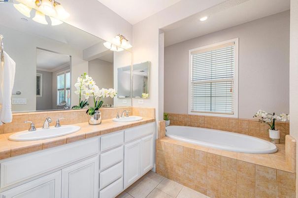Bathroom, Dual Sink Vanities, Interior, Recessed Lighting, Tile Countertops