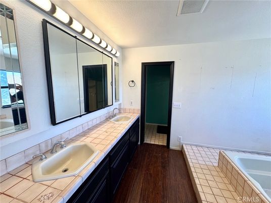 Bathroom, Dual Sink Vanities, Interior, Tile Countertops, Wood Texture Flooring