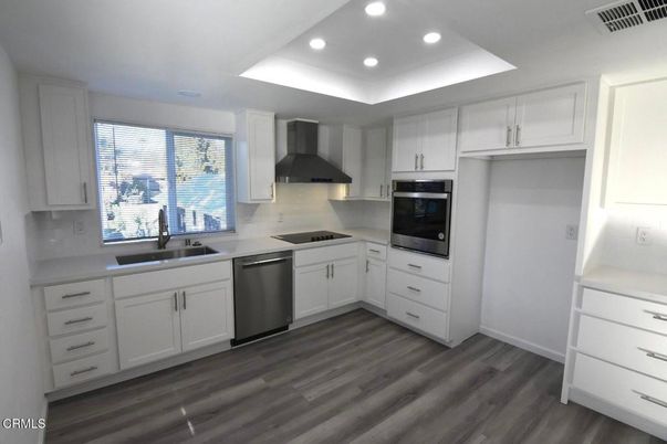 Interior, Kitchen, Recessed Lighting, Stainless Steel Appliances, Wood Texture Flooring