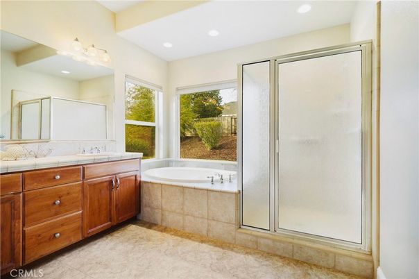 Bathroom, Dual Sink Vanities, Interior, Recessed Lighting, Tile Countertops