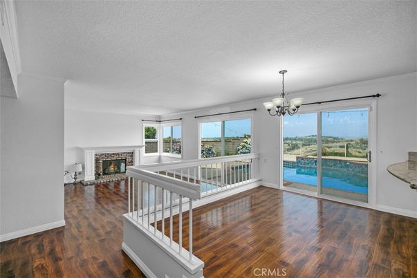 Chandelier, Empty room, Fireplace, Interior, Wood Texture Flooring