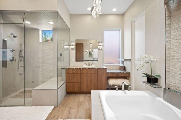 Bathroom, Dual Sink Vanities, Glass Shower, Interior, Pendant Lights, Recessed Lighting, Wood Texture Flooring