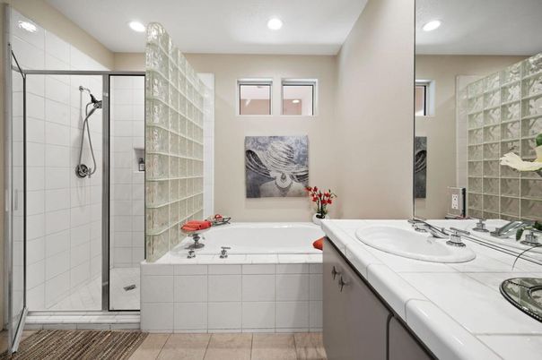 Bathroom, Dual Sink Vanities, Glass Shower, Interior, Recessed Lighting, Tile Countertops