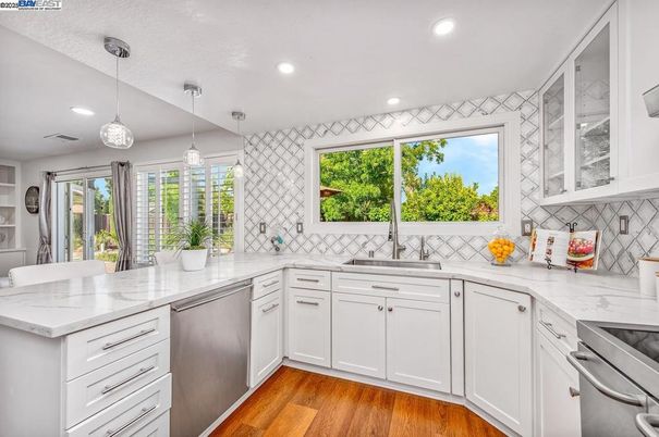 Interior, Kitchen, Pendant Lights, Recessed Lighting, Stainless Steel Appliances, Wood Texture Flooring