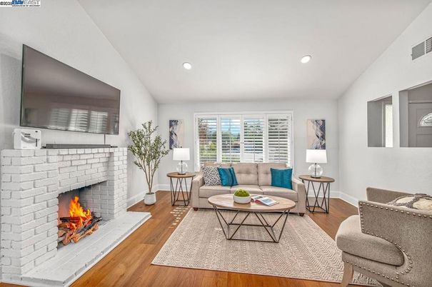 Fireplace, Interior, Living room, Recessed Lighting, Wood Texture Flooring