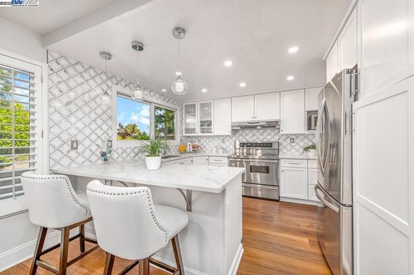 Interior, Kitchen, Pendant Lights, Recessed Lighting, Stainless Steel Appliances, Wood Texture Flooring