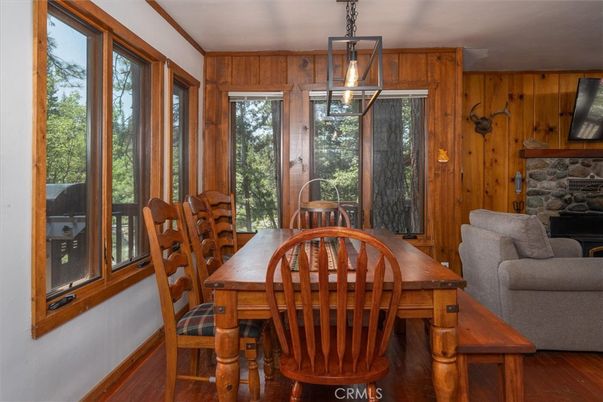 Dining room, Fireplace, Interior, Pendant Lights, Wood Texture Flooring, Wooden Walls