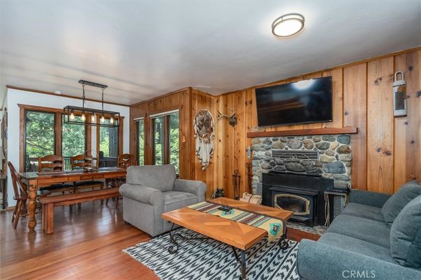 Dining room, Fireplace, Interior, Living room, Pendant Lights, Wood Texture Flooring, Wooden Walls