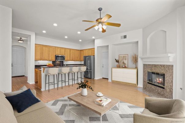 Fireplace, Interior, Kitchen, Living room, Recessed Lighting, Stainless Steel Appliances, Wood Texture Flooring