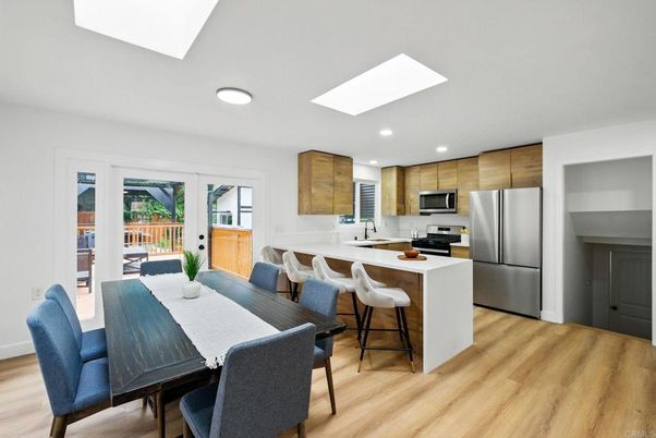 Dining room, Interior, Kitchen, Recessed Lighting, Stainless Steel Appliances, Wood Texture Flooring