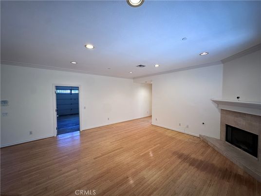 Empty room, Fireplace, Interior, Recessed Lighting, Wood Texture Flooring