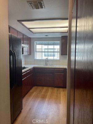 Interior, Kitchen, Tile Countertops, Wood Texture Flooring