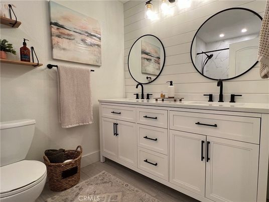 Bathroom, Dual Sink Vanities, Interior, Recessed Lighting, Wood Texture Flooring