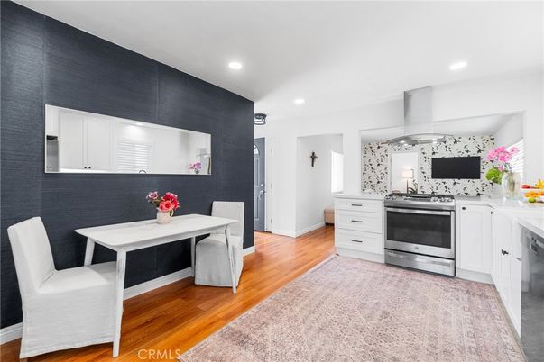 Dining room, Interior, Kitchen, Recessed Lighting, Stainless Steel Appliances, Wood Texture Flooring