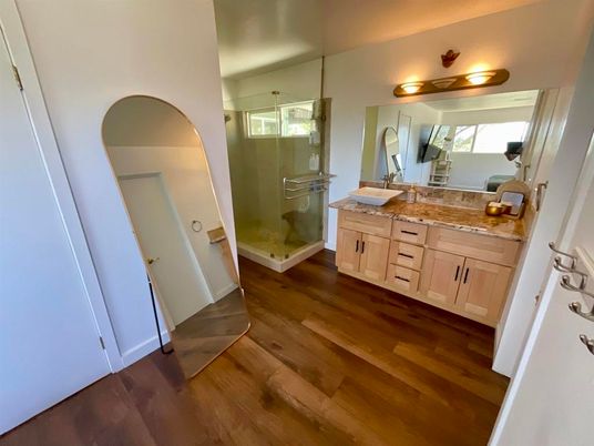 Bathroom, Dual Sink Vanities, Glass Shower, Interior, Wood Texture Flooring