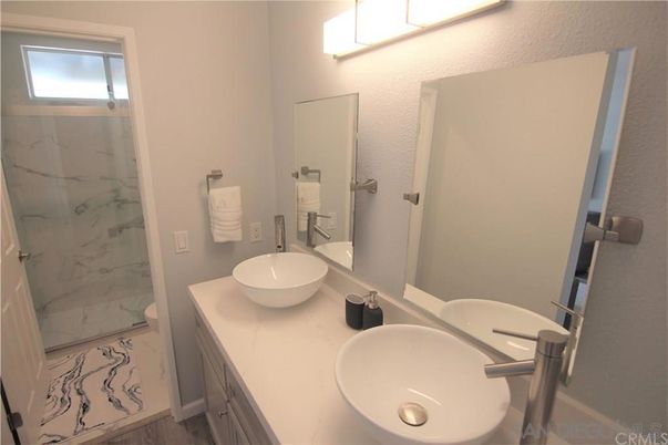 Bathroom, Dual Sink Vanities, Glass Shower, Interior, Marble, Marble Walls