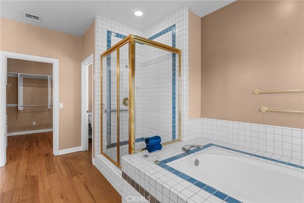Bathroom, Interior, Recessed Lighting, Tile Countertops, Wood Texture Flooring