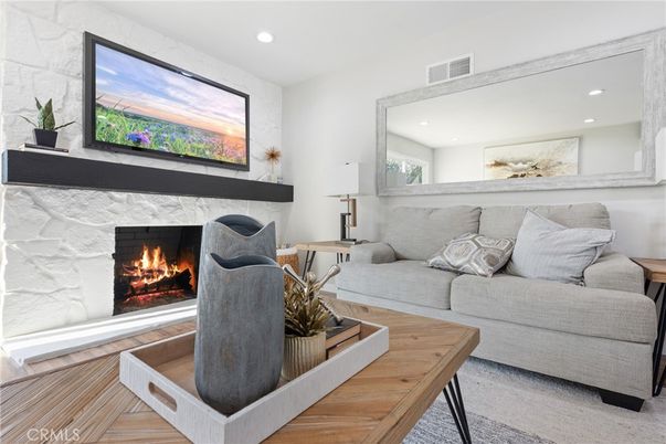 Fireplace, Interior, Living room, Recessed Lighting, Wood Texture Flooring