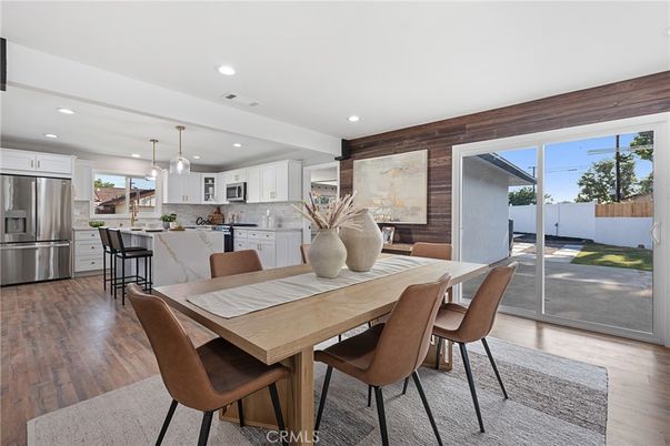 Dining room, Interior, Kitchen, Pendant Lights, Recessed Lighting, Stainless Steel Appliances, Wood Texture Flooring