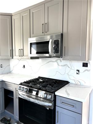 Interior, Kitchen, Marble Walls, Stainless Steel Appliances
