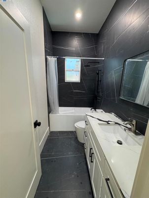 Bathroom, Dual Sink Vanities, Interior, Marble Walls, Recessed Lighting