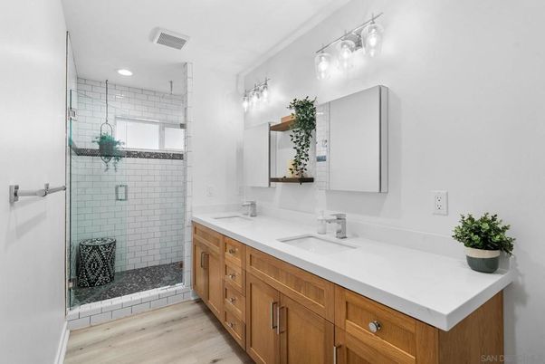 Bathroom, Dual Sink Vanities, Glass Shower, Interior, Recessed Lighting, Wood Texture Flooring