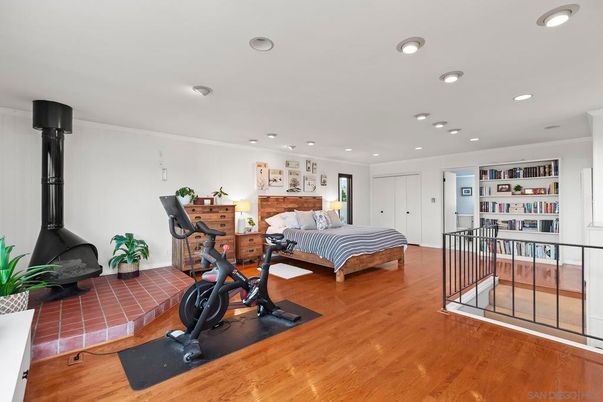 Bedroom, Fireplace, Fitness Equipment, Interior, Recessed Lighting, Wood Texture Flooring