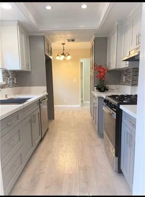 Chandelier, Interior, Kitchen, Recessed Lighting, Stainless Steel Appliances, Wood Texture Flooring