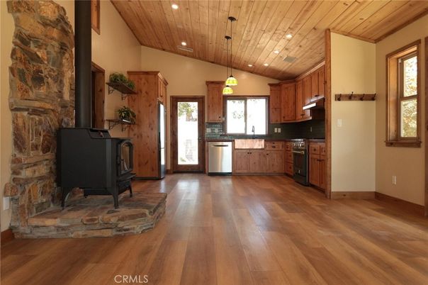 Fireplace, Interior, Kitchen, Pendant Lights, Recessed Lighting, Wooden Ceilings, Wood Texture Flooring